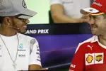 Foto zur News: Lewis Hamilton (Mercedes) und Sebastian Vettel (Ferrari)