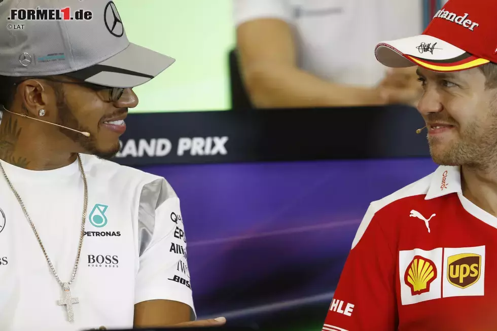 Foto zur News: Lewis Hamilton (Mercedes) und Sebastian Vettel (Ferrari)