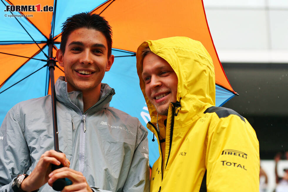 Foto zur News: Esteban Ocon (Manor) und Kevin Magnussen (Renault)