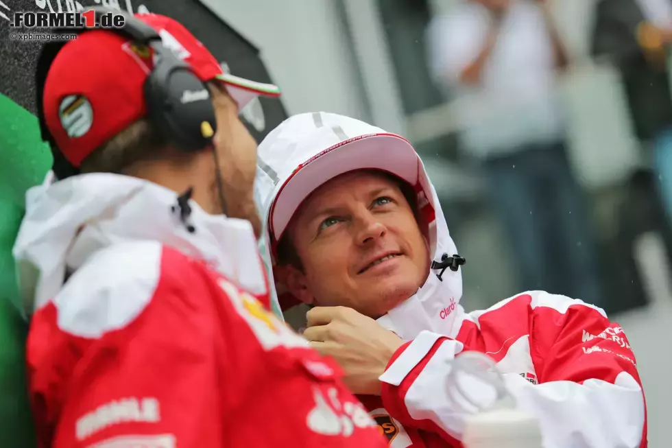 Foto zur News: Sebastian Vettel (Ferrari) und Kimi Räikkönen (Ferrari)