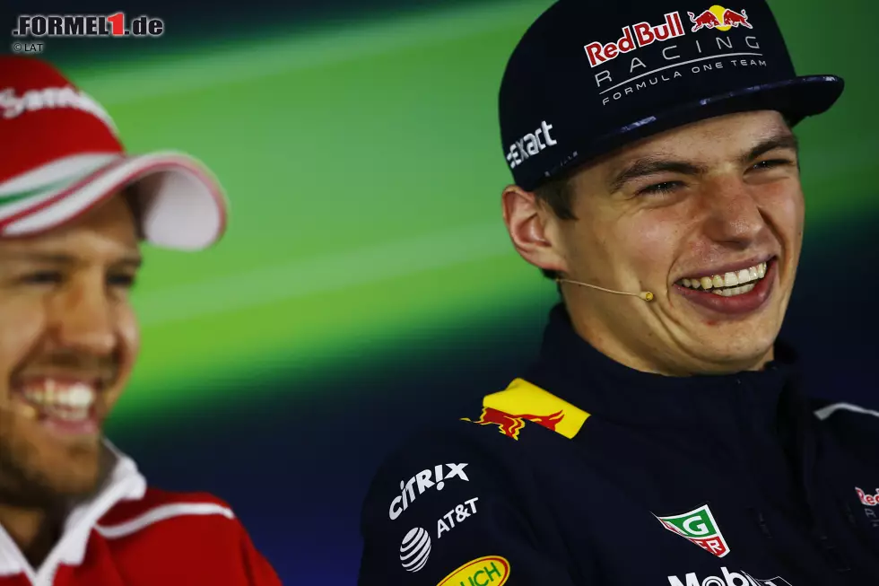 Foto zur News: Sebastian Vettel (Ferrari) und Max Verstappen (Red Bull)