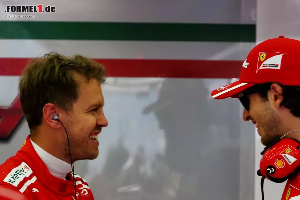 Foto zur News: Sebastian Vettel (Ferrari) und Antonio Giovinazzi (Sauber)