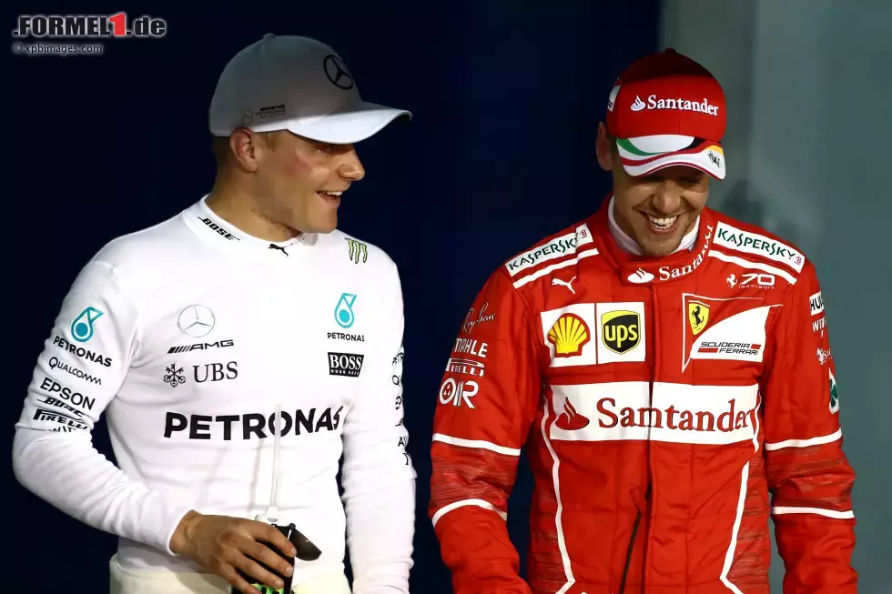 Foto zur News: Valtteri Bottas (Mercedes) und Sebastian Vettel (Ferrari)