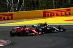 Foto zur News: Sebastian Vettel (Ferrari) und Lewis Hamilton (Mercedes)