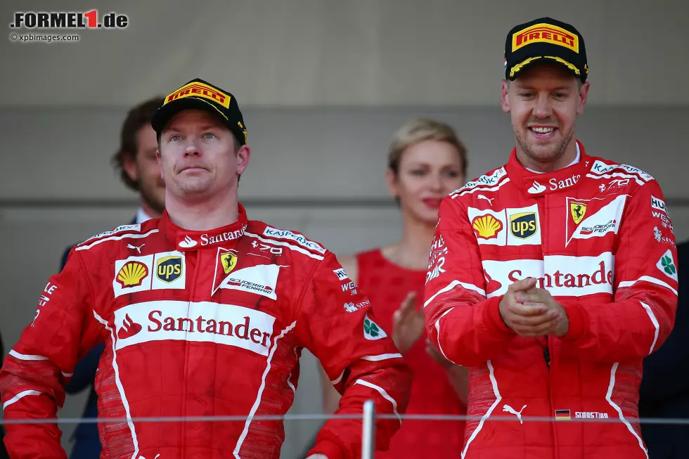 Foto zur News: Kimi Räikkönen (Ferrari) und Sebastian Vettel (Ferrari)