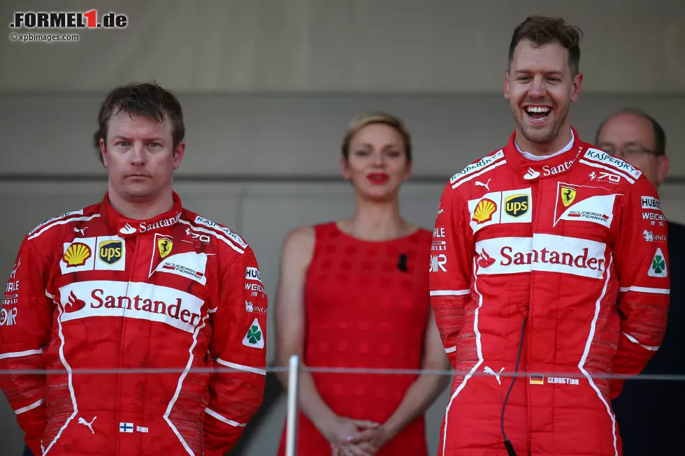 Foto zur News: Kimi Räikkönen (Ferrari) und Sebastian Vettel (Ferrari)