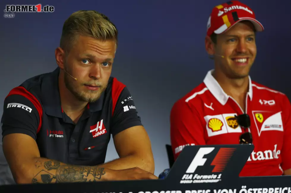 Foto zur News: Kevin Magnussen (Haas) und Sebastian Vettel (Ferrari)