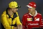 Foto zur News: Nico Hülkenberg (Renault) und Sebastian Vettel (Ferrari)