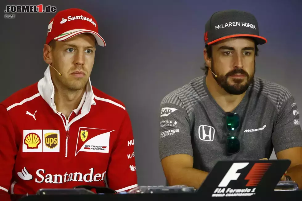 Foto zur News: Sebastian Vettel (Ferrari) und Fernando Alonso (McLaren)