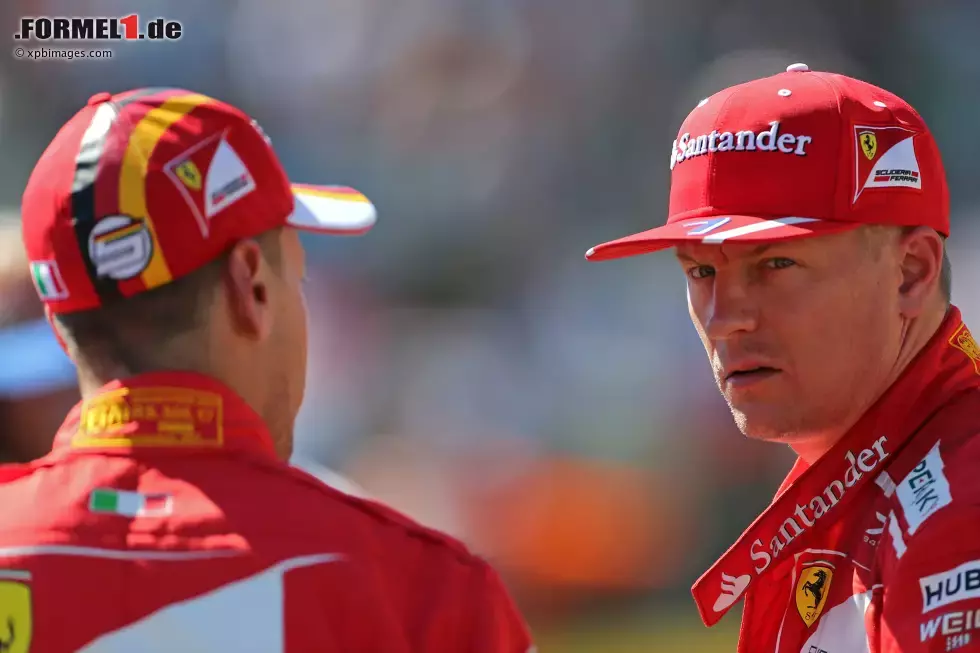 Foto zur News: Kimi Räikkönen (Ferrari) und Sebastian Vettel (Ferrari)