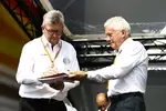 Foto zur News: Ross Brawn und Charlie Whiting