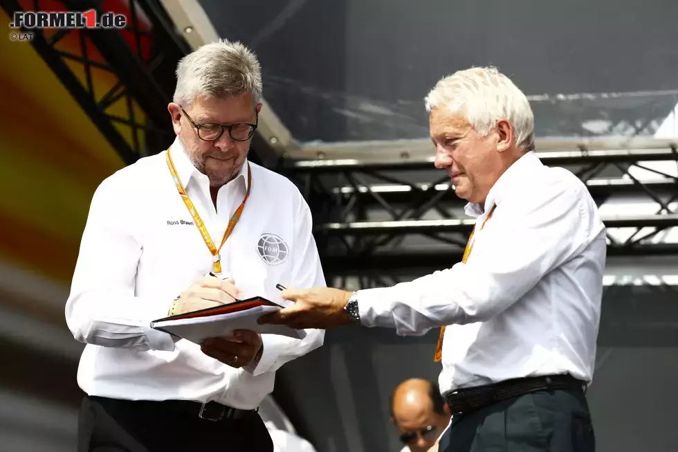 Foto zur News: Ross Brawn und Charlie Whiting