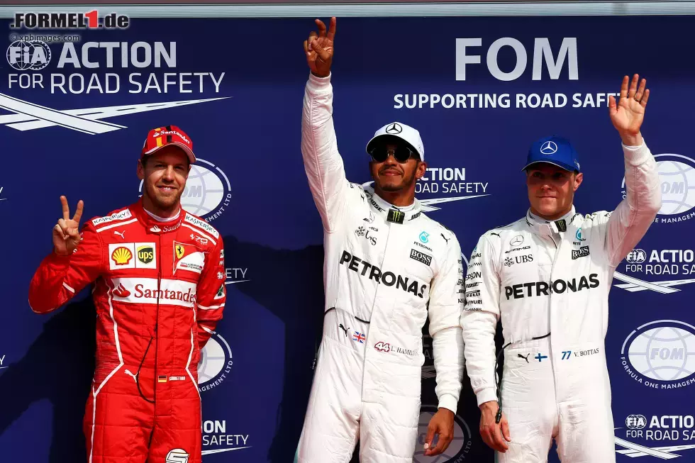 Foto zur News: Sebastian Vettel (Ferrari), Lewis Hamilton (Mercedes) und Valtteri Bottas (Mercedes)