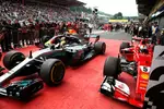 Foto zur News: Lewis Hamilton (Mercedes) und Sebastian Vettel (Ferrari)