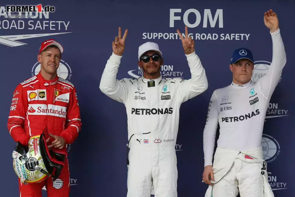 Foto zur News: Lewis Hamilton (Mercedes), Sebastian Vettel (Ferrari) und Valtteri Bottas (Mercedes)