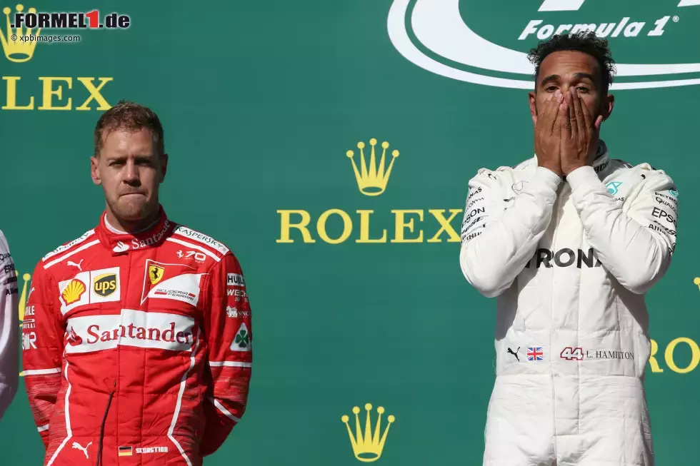 Foto zur News: Sebastian Vettel (Ferrari) und Lewis Hamilton (Mercedes)