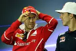 Foto zur News: Sebastian Vettel (Ferrari) und Pierre Gasly (Toro Rosso)