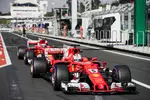 Foto zur News: Sebastian Vettel (Ferrari) und Kimi Räikkönen (Ferrari)