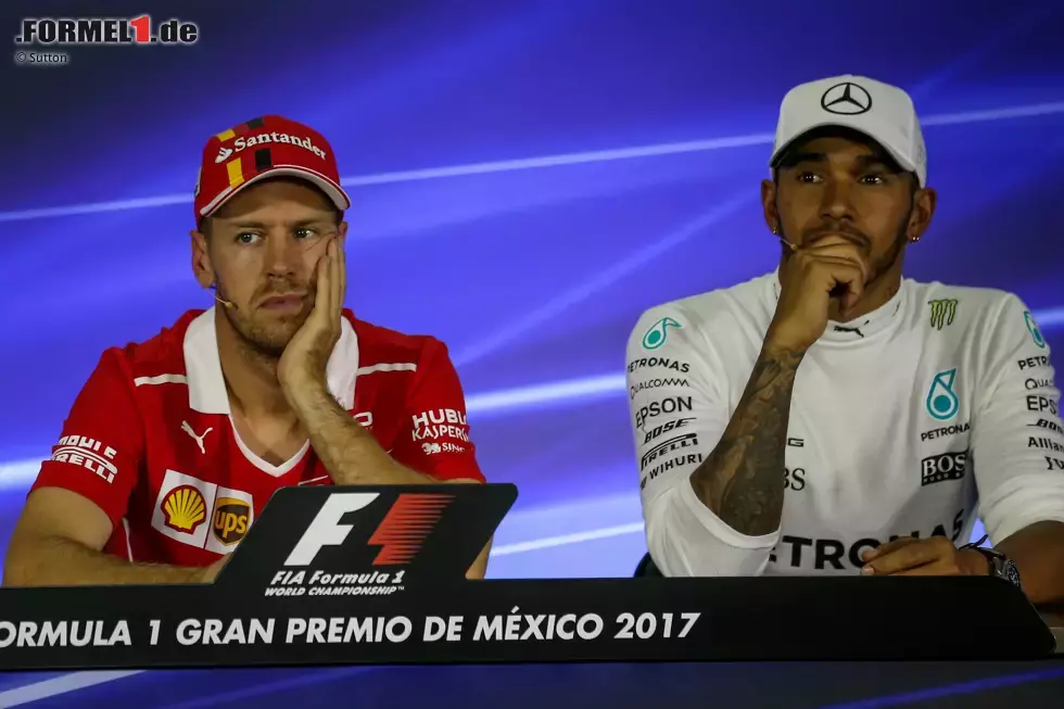 Foto zur News: Sebastian Vettel (Ferrari) und Lewis Hamilton (Mercedes)