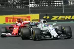 Foto zur News: Felipe Massa (Williams) und Sebastian Vettel (Ferrari)