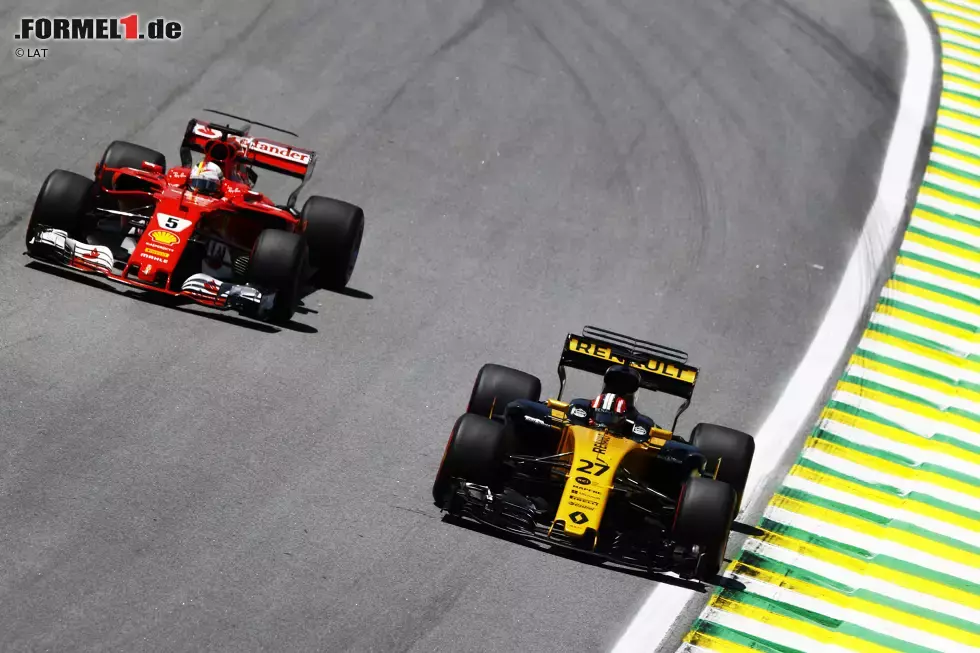 Foto zur News: Nico Hülkenberg (Renault) und Sebastian Vettel (Ferrari)