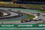 Foto zur News: Kevin Magnussen (Haas), Daniel Ricciardo (Red Bull) und Stoffel Vandoorne (McLaren)