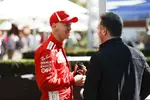 Foto zur News: Sebastian Vettel (Ferrari) und Christian Horner