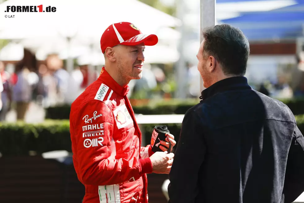 Foto zur News: Sebastian Vettel (Ferrari) und Christian Horner