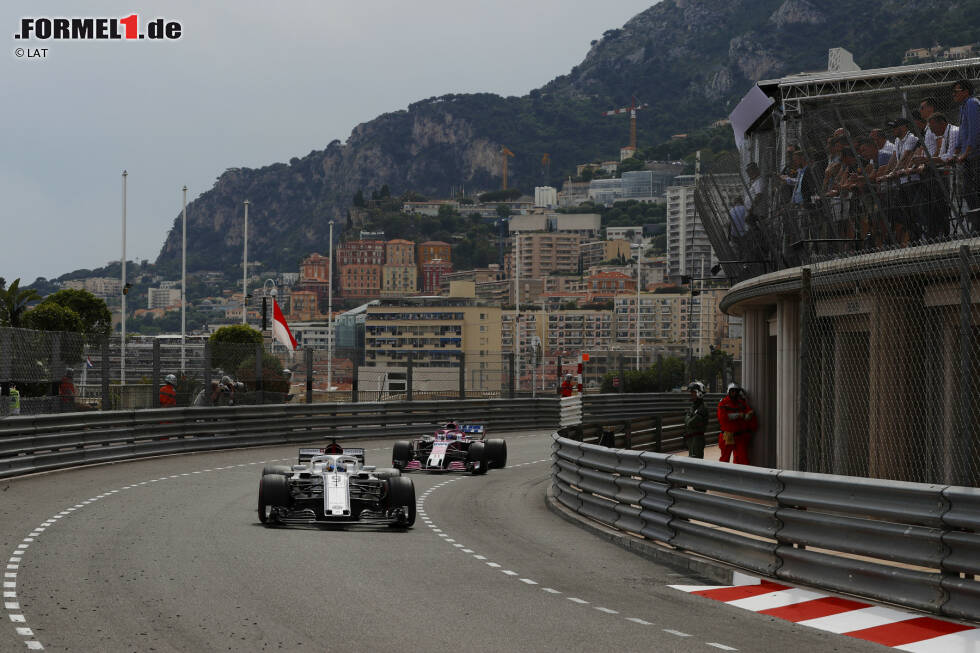 Foto zur News: Marcus Ericsson (Sauber) und Sergio Perez (Force India)