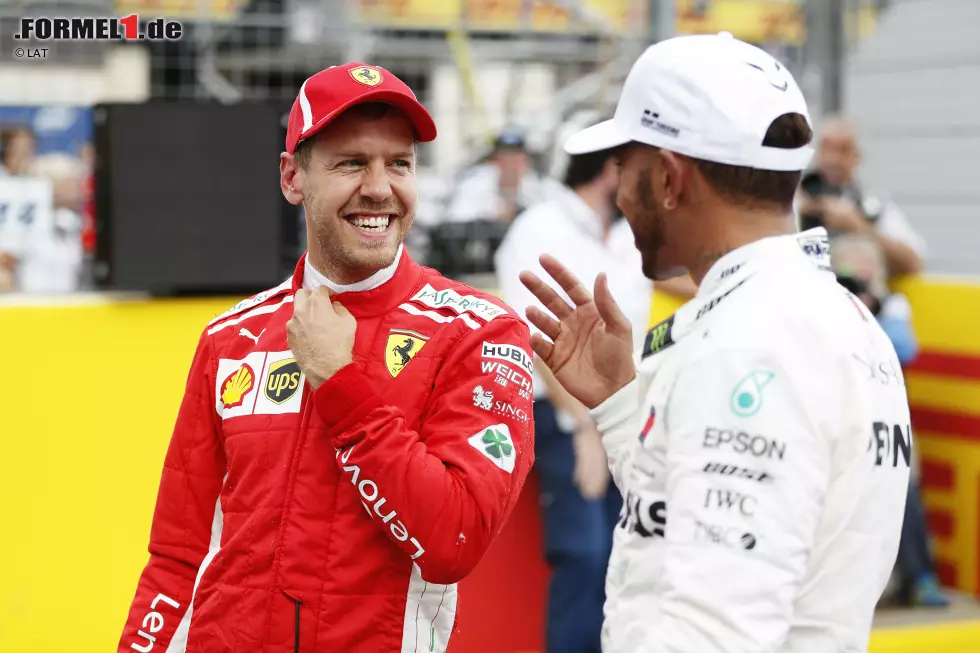 Foto zur News: Sebastian Vettel (Ferrari) und Lewis Hamilton (Mercedes)