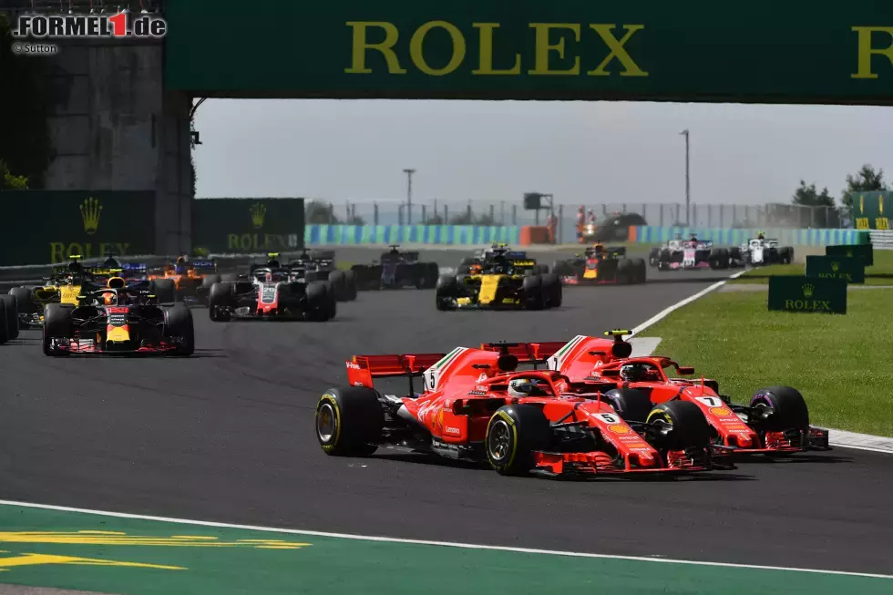 Foto zur News: Sebastian Vettel (Ferrari) und Kimi Räikkönen (Ferrari)