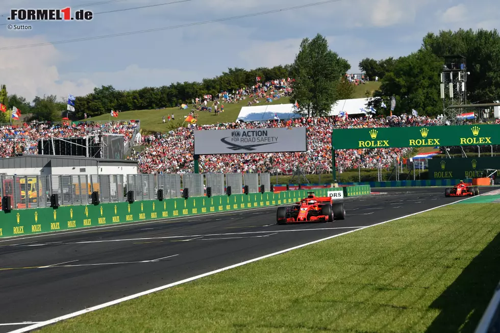 Foto zur News: Sebastian Vettel (Ferrari) und Kimi Räikkönen (Ferrari)