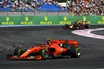 Foto zur News: Charles Leclerc (Ferrari) und Max Verstappen (Red Bull)