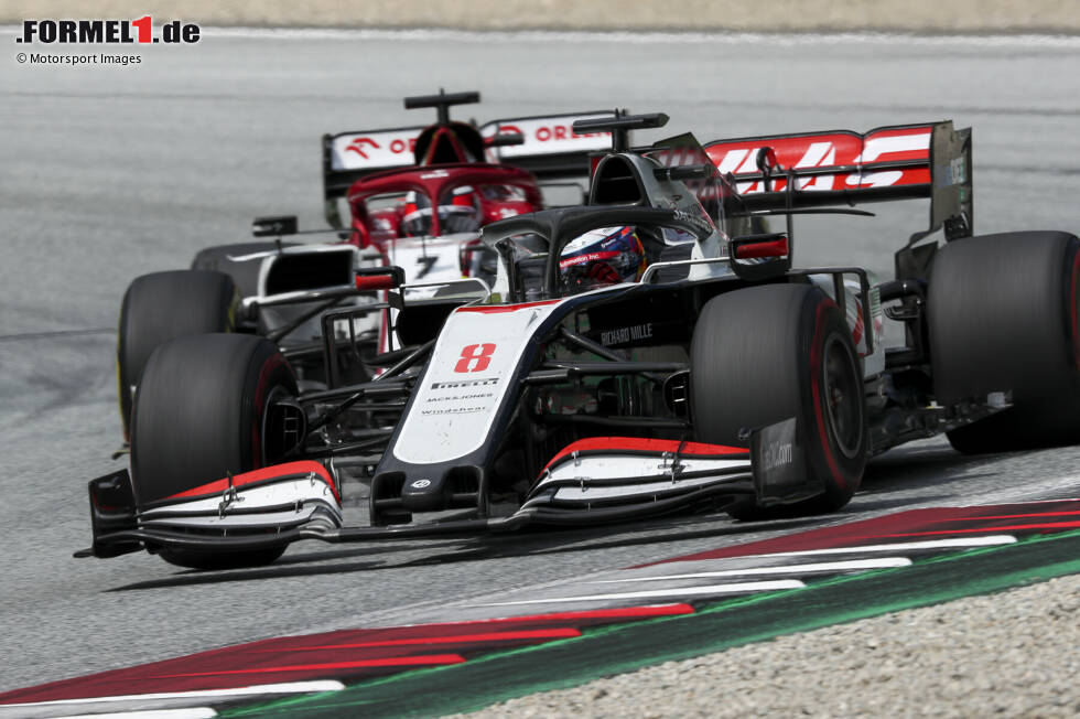 Foto zur News: Romain Grosjean (Haas) und Kimi Räikkönen (Alfa Romeo)
