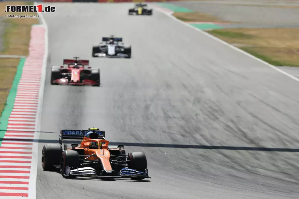 Foto zur News: Lando Norris (McLaren) und Sebastian Vettel (Ferrari)