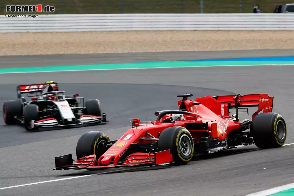 Foto zur News: Sebastian Vettel (Ferrari) und Kevin Magnussen (Haas)