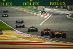 Foto zur News: Esteban Ocon (Renault), Sebastian Vettel (Ferrari) und Lando Norris (McLaren)