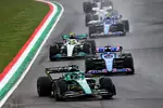 Foto zur News: Lance Stroll (Aston Martin), Fernando Alonso (Alpine) und Lewis Hamilton (Mercedes)