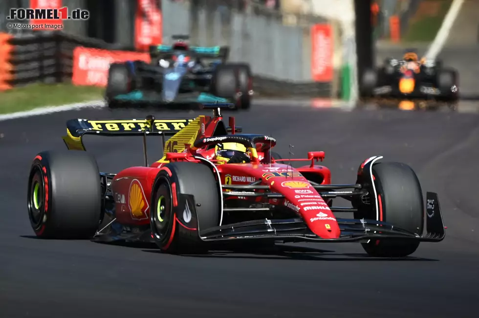 Foto zur News: Charles Leclerc (Ferrari) und George Russell (Mercedes)