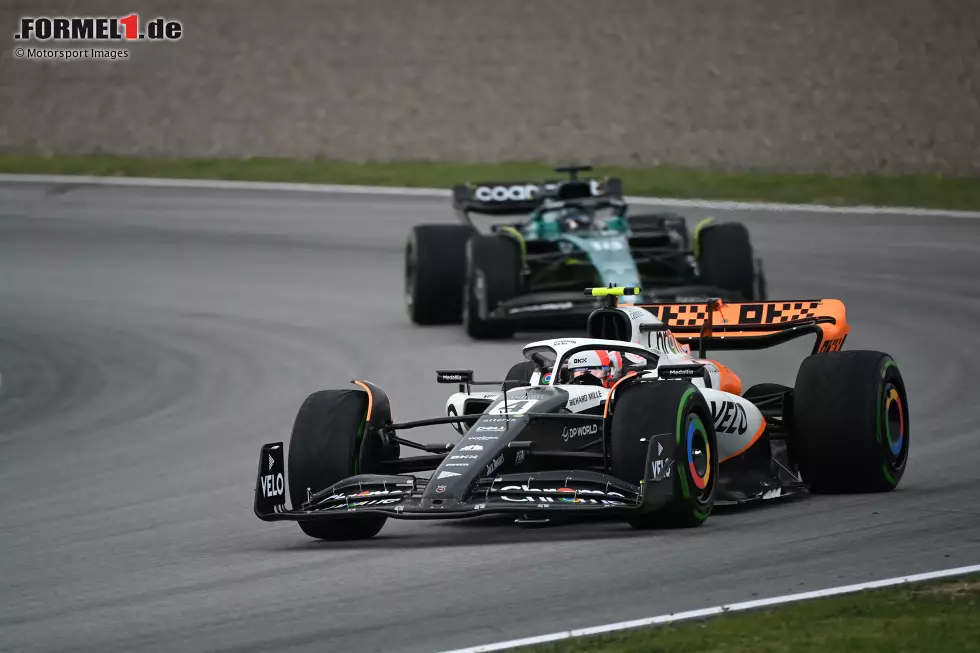 Foto zur News: Lando Norris (McLaren) und Lance Stroll (Aston Martin)