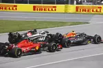 Foto zur News: Sergio Perez (Red Bull), Kevin Magnussen (Haas) und Carlos Sainz (Ferrari)