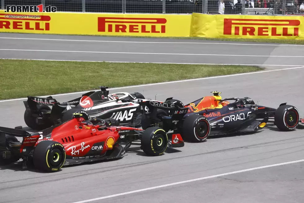 Foto zur News: Sergio Perez (Red Bull), Kevin Magnussen (Haas) und Carlos Sainz (Ferrari)