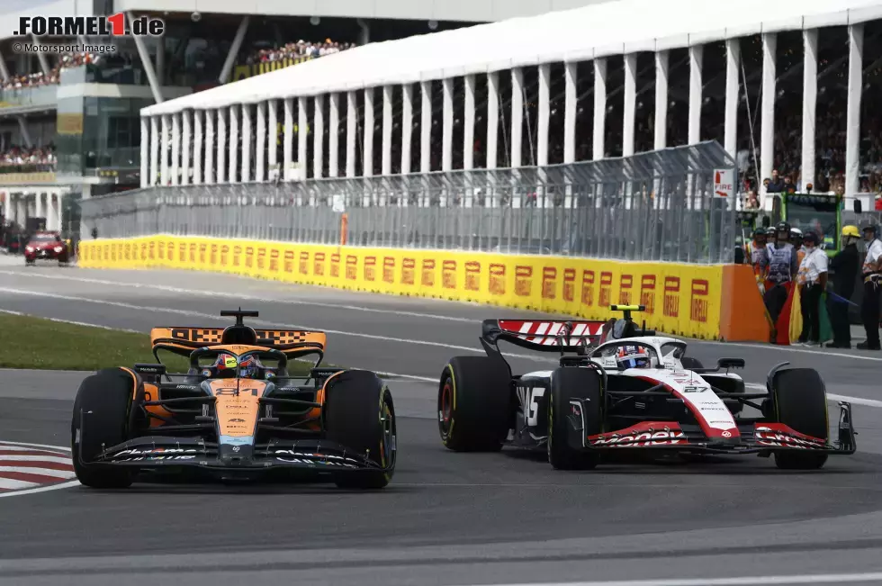 Foto zur News: Oscar Piastri (McLaren) und Nico Hülkenberg (Haas)