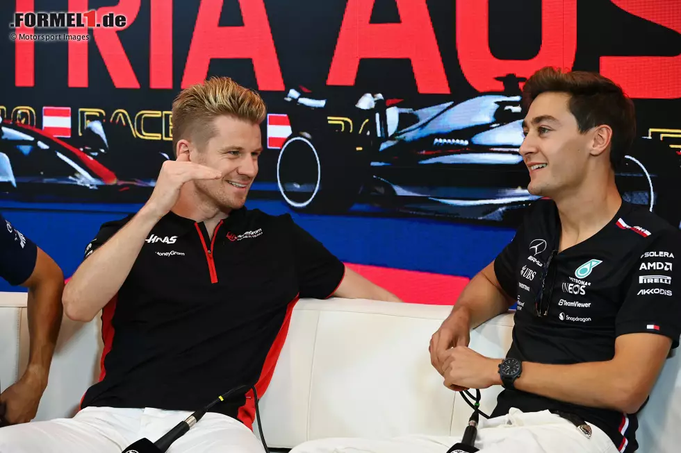 Foto zur News: Nico Hülkenberg (Haas) und George Russell (Mercedes)