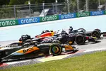 Foto zur News: Yuki Tsunoda (AlphaTauri), Sergio Perez (Red Bull) und Oscar Piastri (McLaren)