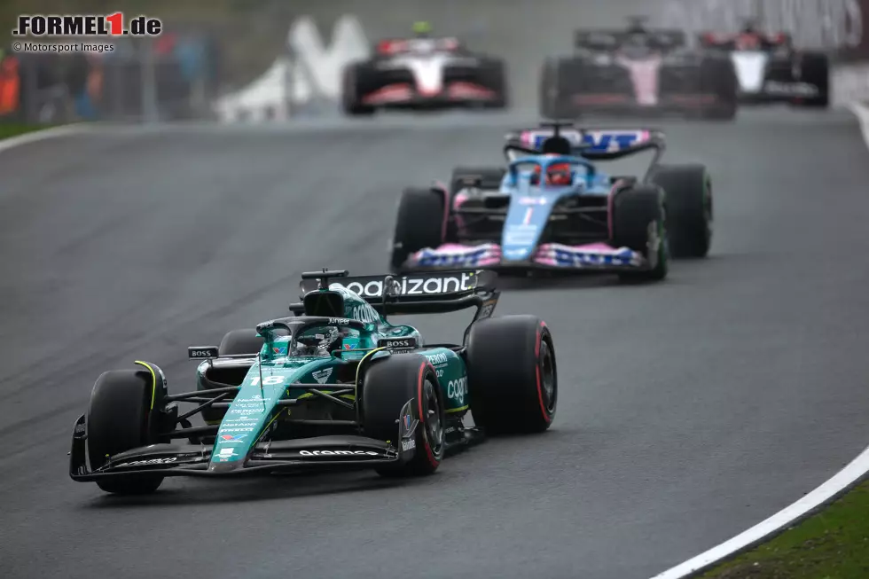 Foto zur News: Lance Stroll (Aston Martin) und Esteban Ocon (Alpine)