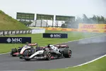 Foto zur News: Liam Lawson (AlphaTauri) und Nico Hülkenberg (Haas)