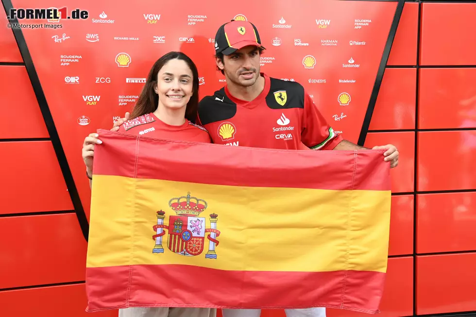 Foto zur News: Carlos Sainz (Ferrari) und Marta Garcia