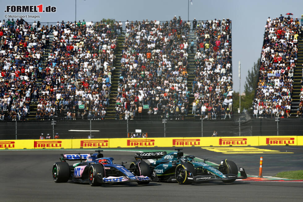 Foto zur News: Lance Stroll (Aston Martin) und Esteban Ocon (Alpine)