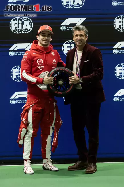 Foto zur News: Charles Leclerc (Ferrari) und Patrick Dempsey